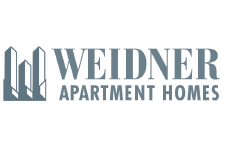 Weidner Apartment Homes Logo in medium blue with abstracted skyscraper buildings